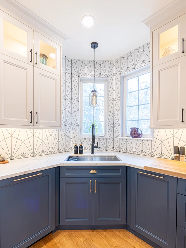 Contemporary kitchen remodeling project with a custom kitchen island, stylish backsplash, and open-concept layout in Alexandria, VA.